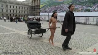 Naked hot girl pulling charios in public