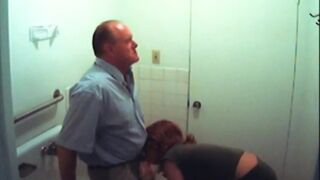 Bathroom whore sucks meat in restroom