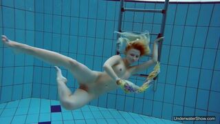 Flirty tight perfect sexy girl swimming gymnastics